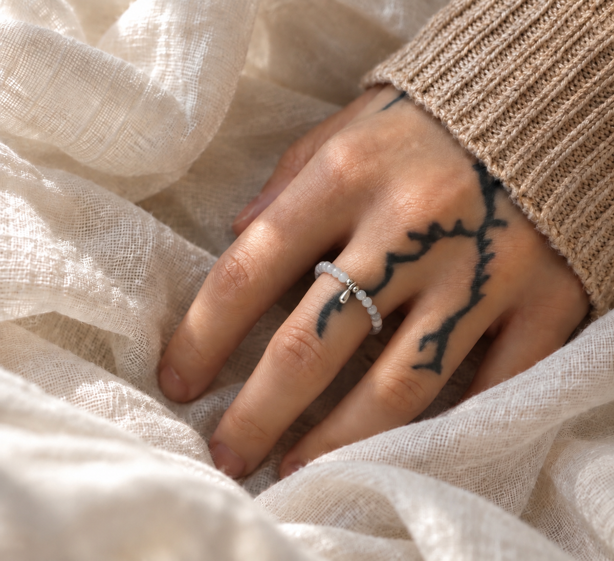Caim prstýnek - Mušle Stříbrná